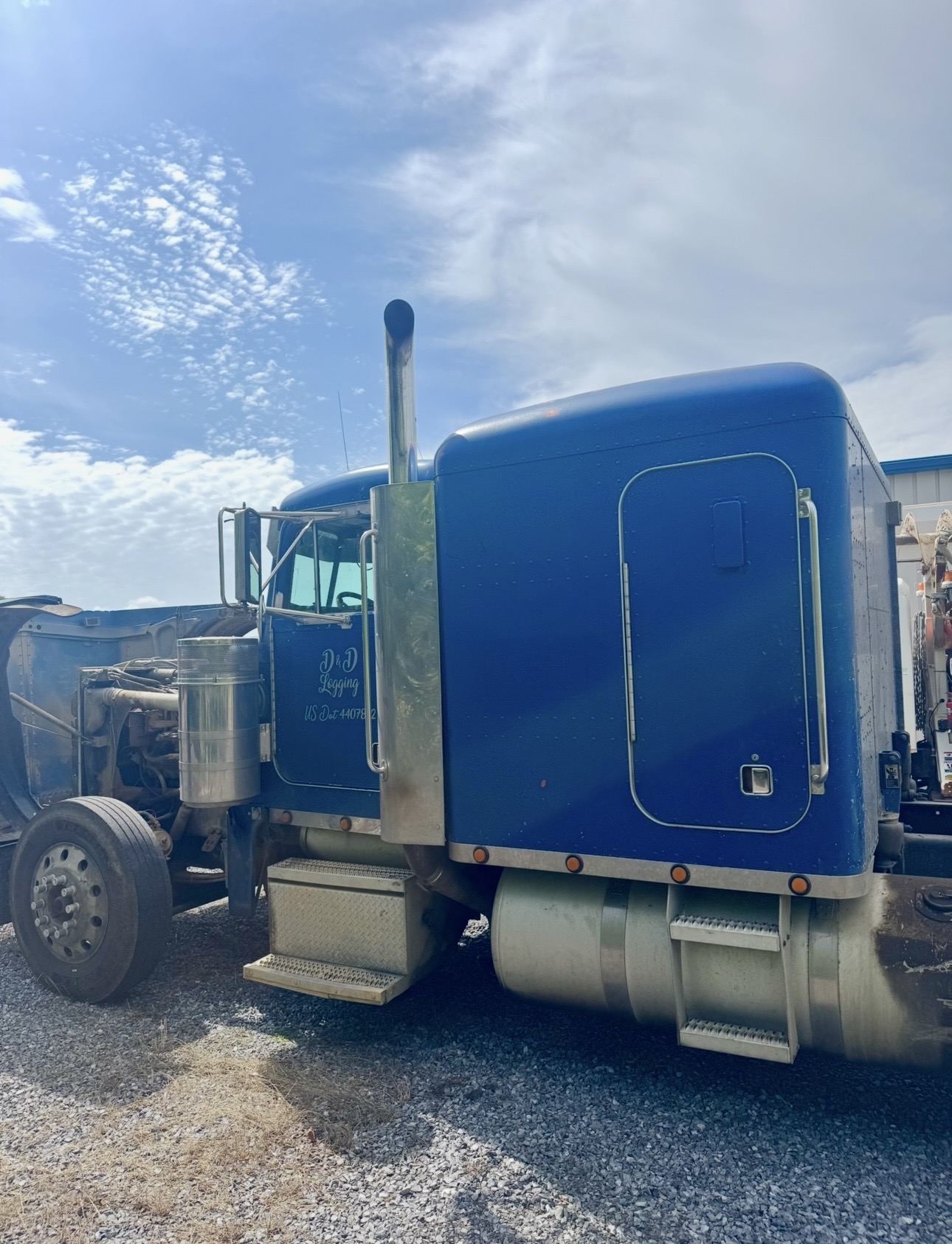 Log truck before pressure wash